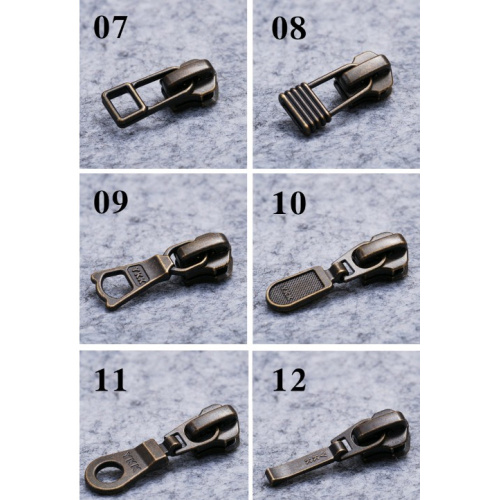 Бегунок, зажимы, ограничители для молнии №5 YKK под бронзу фото 3
