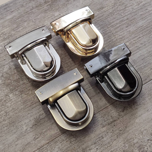 Уценка! Застежки портфельные 30-40 мм с рельефной кнопкой Уценка! Застежки портфельные 30-40 мм с рельефной кнопкой