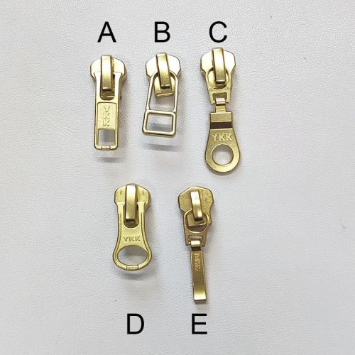 Бегунок с пуллером для молнии №5 YKK, цвет золото фото 2 Бегунок с пуллером для молнии №5 YKK, цвет золото фото 2