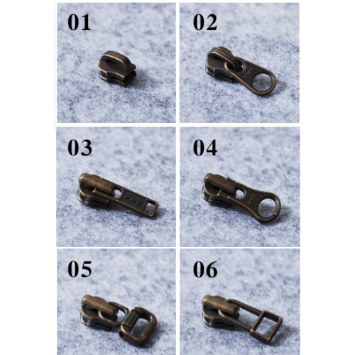 Бегунок, зажимы, ограничители для молнии №3 YKK под бронзу фото 2