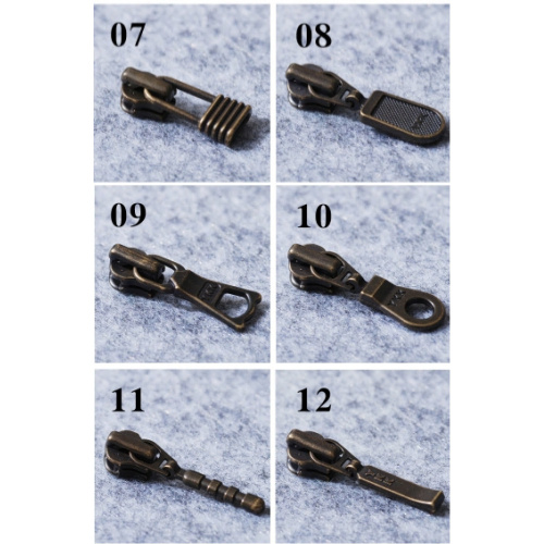 Бегунок, зажимы, ограничители для молнии №3 YKK под бронзу фото 3